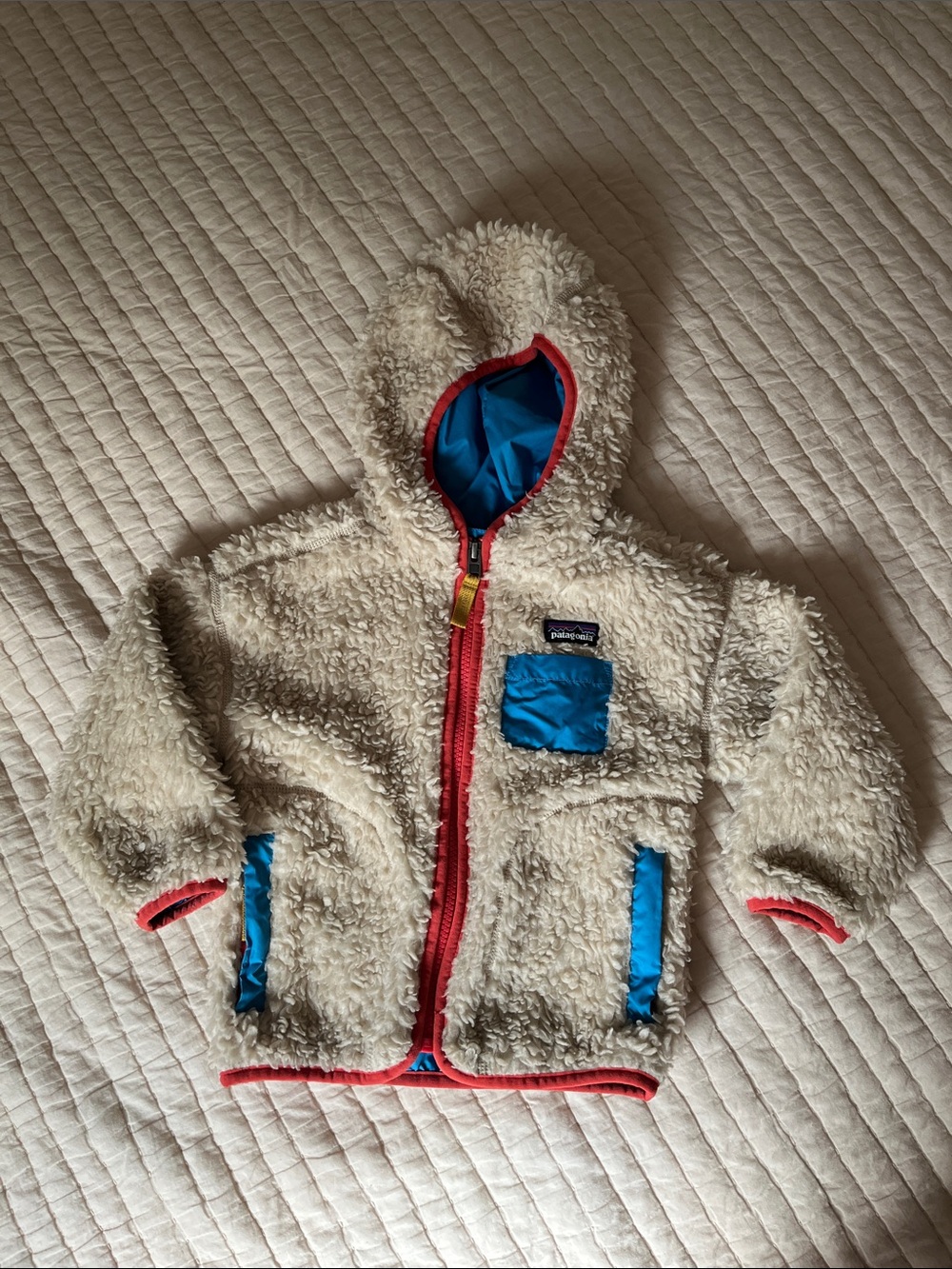 Patagonia Kids Cream Sherpa Hoodie with Blue and Red Trim